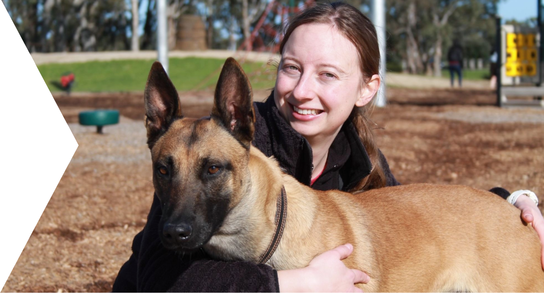 Woman hugging her dog